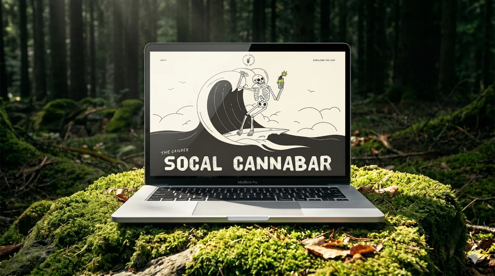 SoCal Cannabar cannabis brand website concept displayed on a laptop in a forest setting